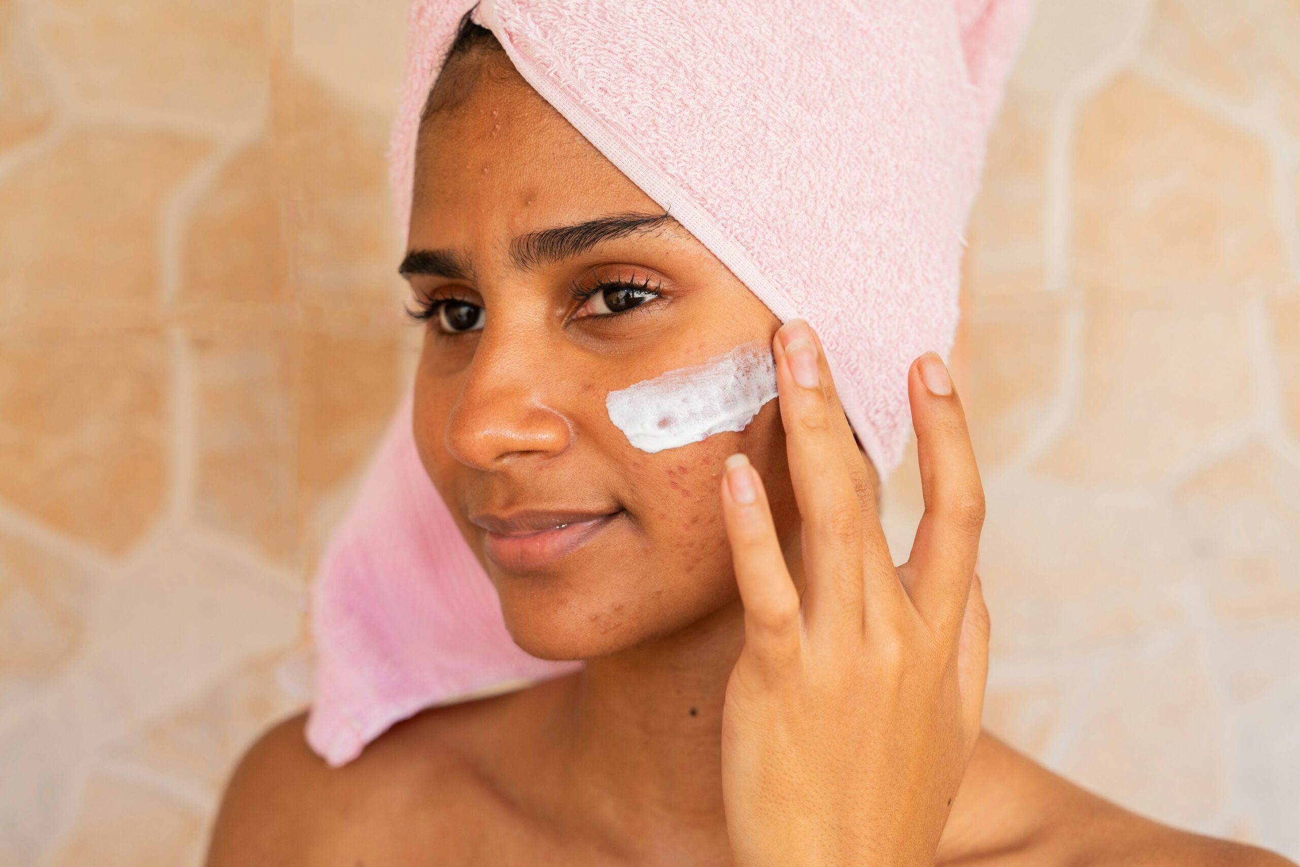 Woman showing morning skincare
